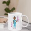 sticker mockup placed on an 11 oz coffee mug 33621 11oz Personalized Black Nurse Mug